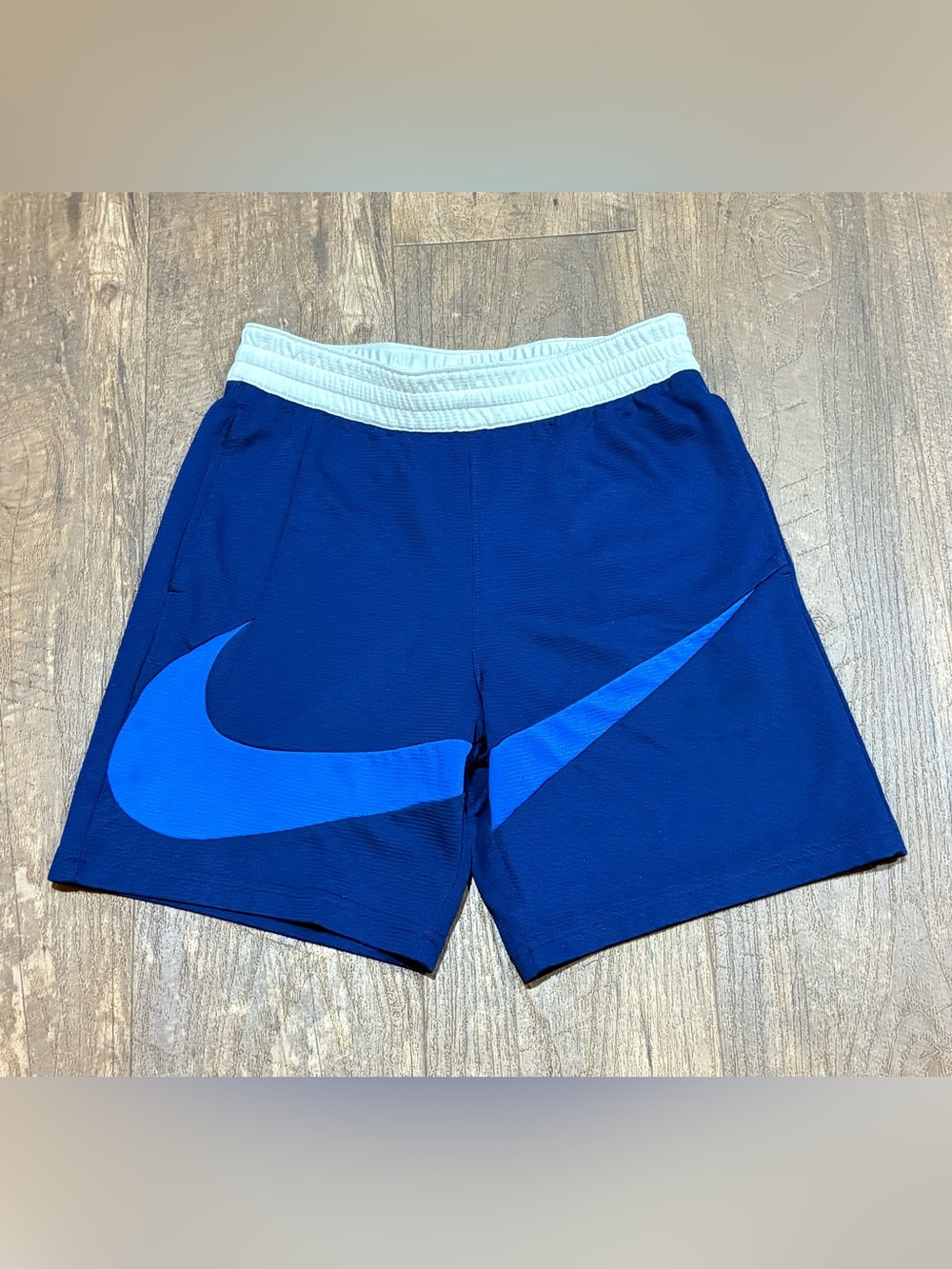 Nike Royal Blue Kids Athletic Shorts with Light Blue Swoosh and White Waistband